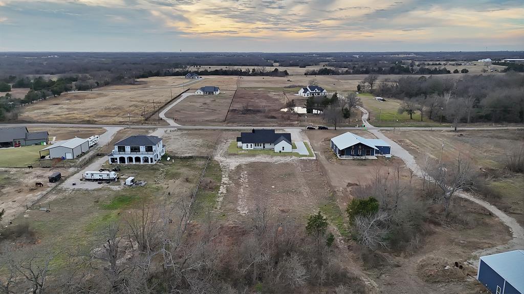 3089 County Road 1076 Celeste, TX 75423 - Photo 39 of 39 an aerial view of a house with a yard