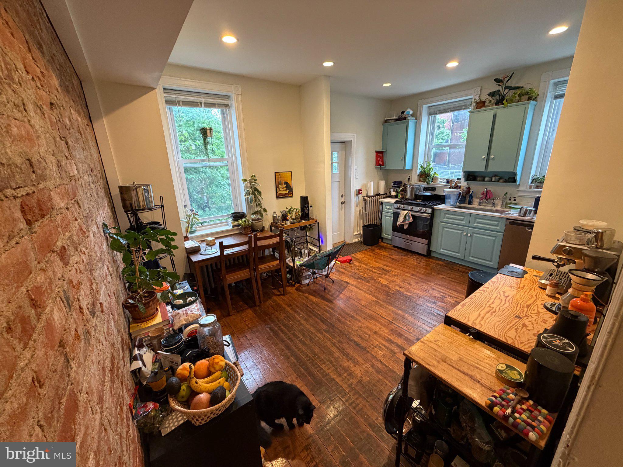 815 South 49th Street Philadelphia, PA 19143 - Photo 2 of 72 a living room with furniture fireplace and rug
