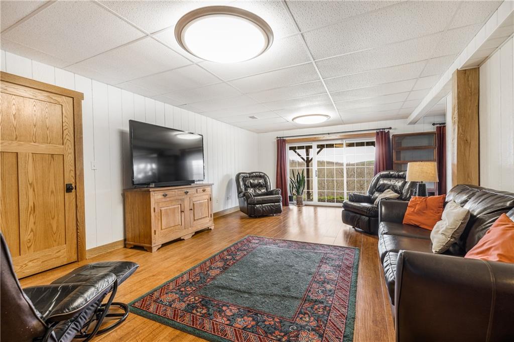 298 Laird's Crossing Road Worthington, PA 16262 - Photo 20 of 25 a living room with furniture and a flat screen tv