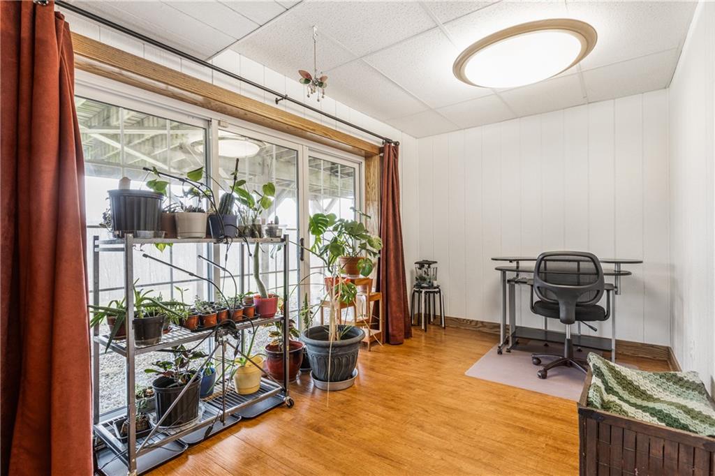 298 Laird's Crossing Road Worthington, PA 16262 - Photo 21 of 25 a view of a workspace with furniture and a window