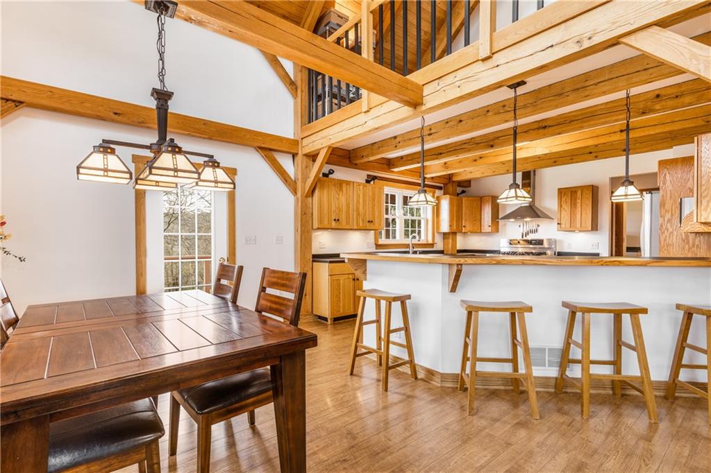 298 Laird's Crossing Road Worthington, PA 16262 - Photo 5 of 25 a dining room with furniture and wooden floor