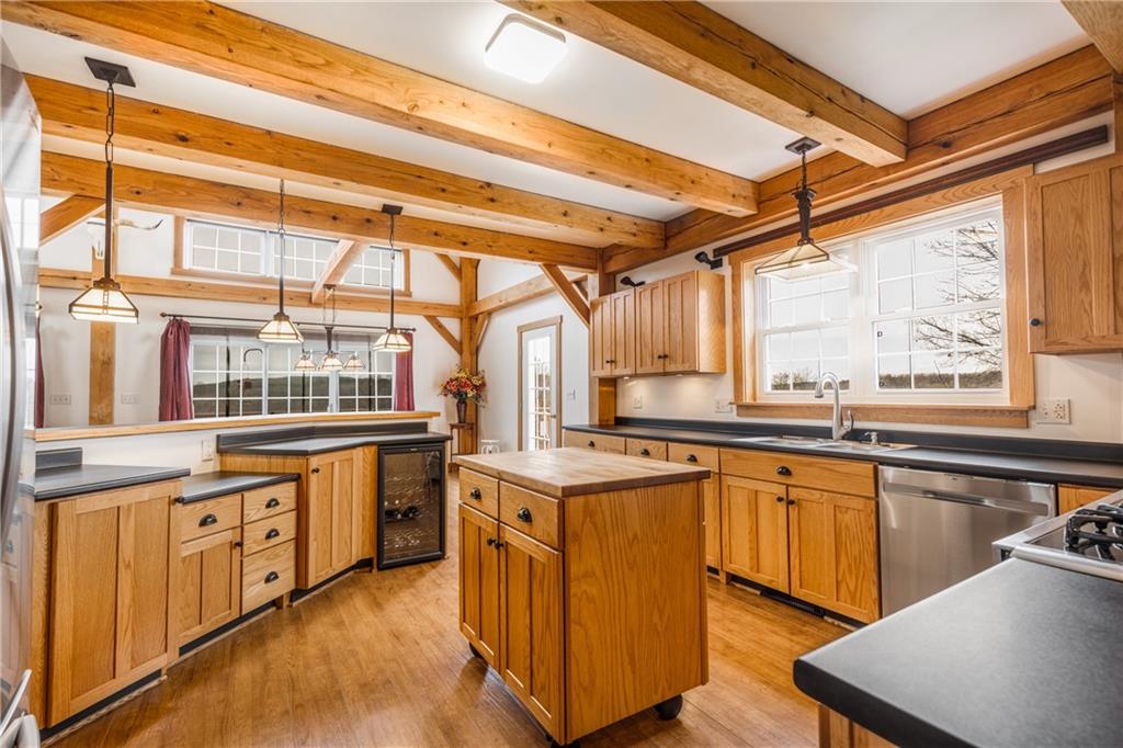 298 Laird's Crossing Road Worthington, PA 16262 - Photo 7 of 25 a kitchen with stainless steel appliances granite countertop a stove and cabinets