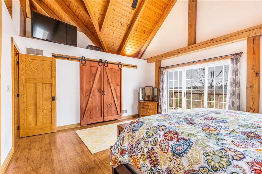 298 Laird's Crossing Road Worthington, PA 16262 - Photo 10 of 25 a bed sitting in a spacious bedroom next to a window