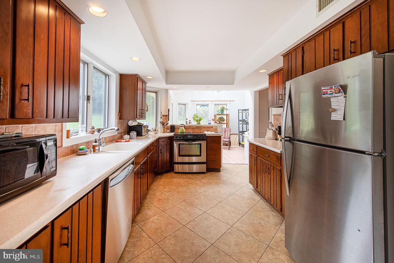 435 Reeds Road Downingtown, PA 19335 - Photo 21 of 55 Kitchen towards Garden Room
