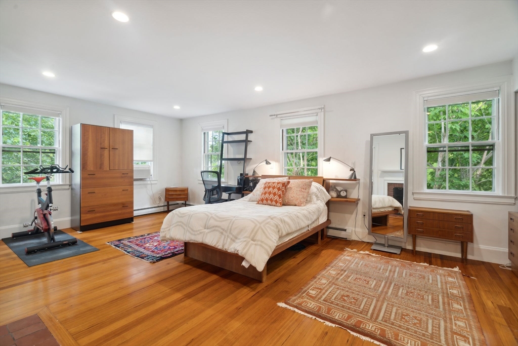 172 Bellevue Road Watertown, MA 02472 - Photo 15 of 34 a spacious bedroom with a large bed and a large window