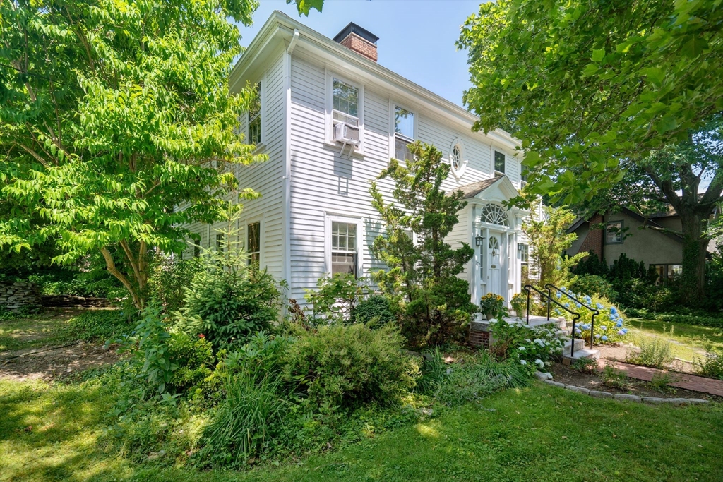 172 Bellevue Road Watertown, MA 02472 - Photo 2 of 34 a view of a house with a backyard