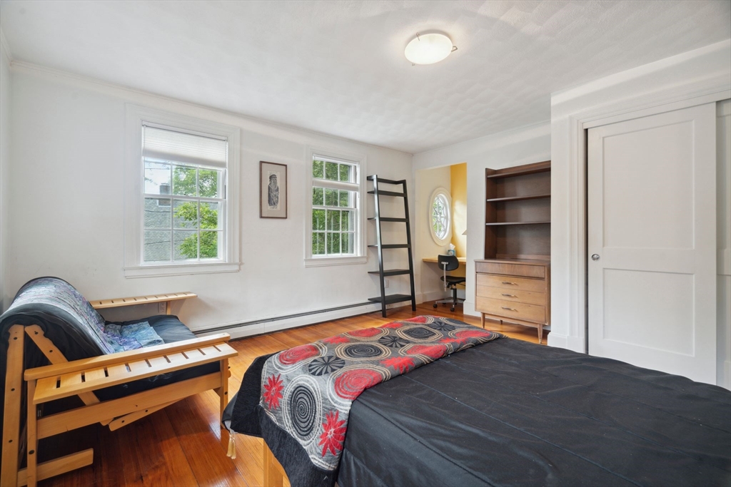 172 Bellevue Road Watertown, MA 02472 - Photo 22 of 34 a bedroom with a bed and a window