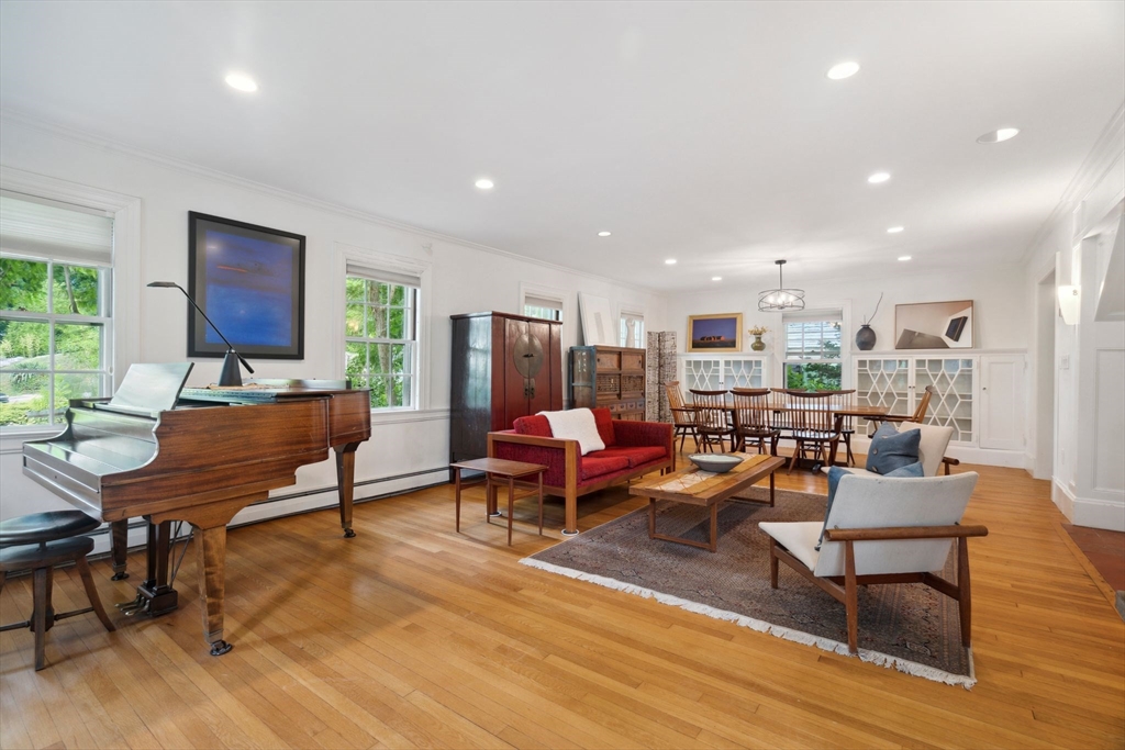 172 Bellevue Road Watertown, MA 02472 - Photo 3 of 34 a living room with furniture a rug and a table
