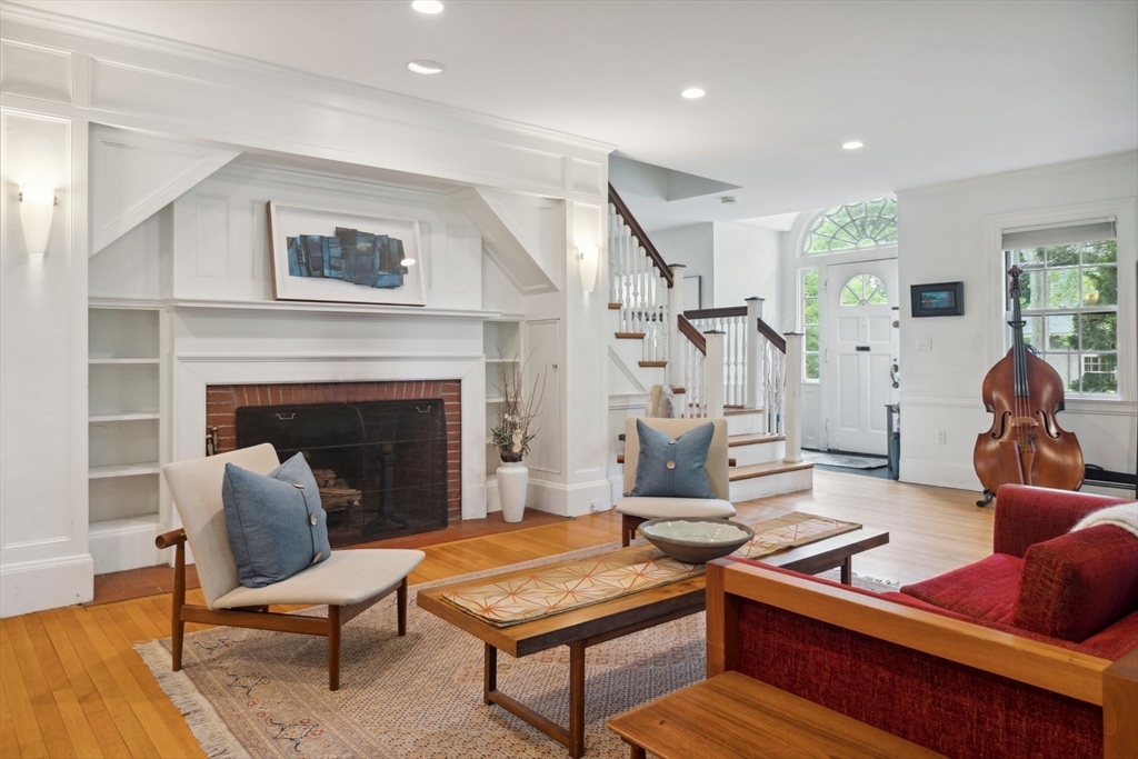172 Bellevue Road Watertown, MA 02472 - Photo 7 of 34 a living room with furniture and a fireplace