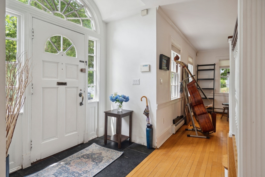 172 Bellevue Road Watertown, MA 02472 - Photo 8 of 34 a view of an entryway with wooden floor