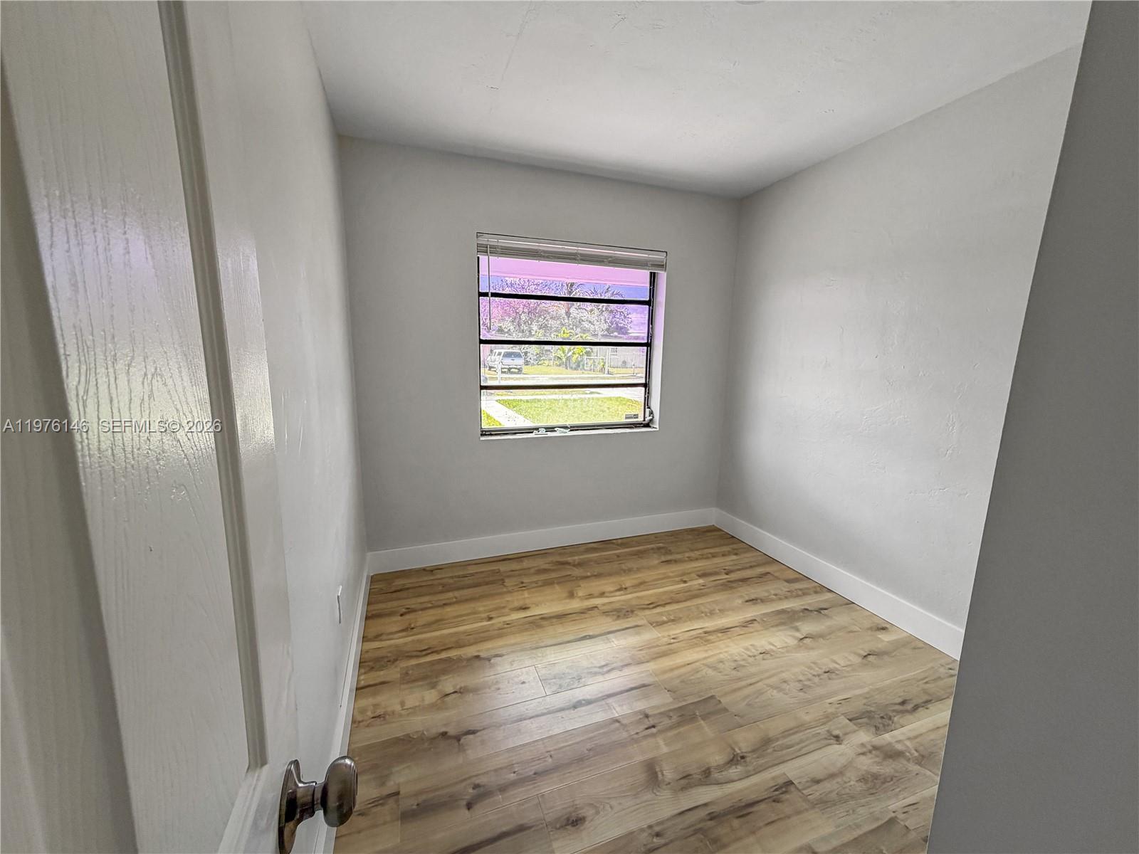 5245 Southwest 98th Court Miami, FL 33165 - Photo 13 of 22 a view of an empty room and window