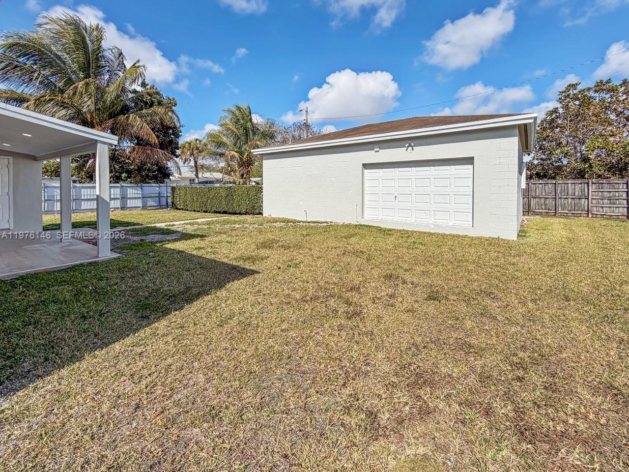 5245 Southwest 98th Court Miami, FL 33165 - Photo 19 of 22 a view of backyard of house with green space