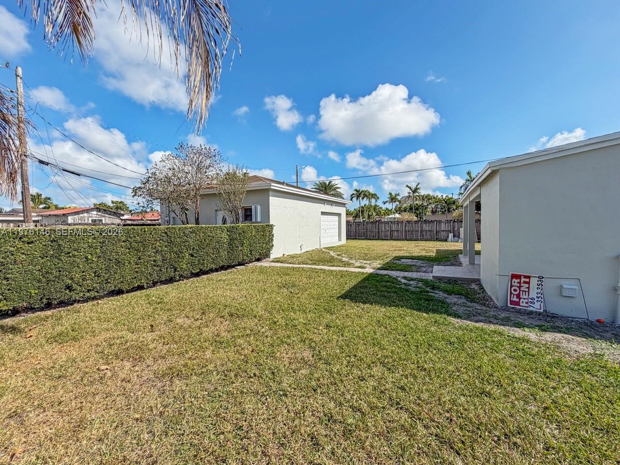 5245 Southwest 98th Court Miami, FL 33165 - Photo 20 of 22 a view of a back yard of the house