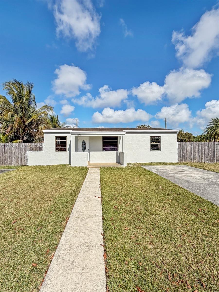 5245 Southwest 98th Court Miami, FL 33165 - Photo 21 of 22 front view of a house with a yard