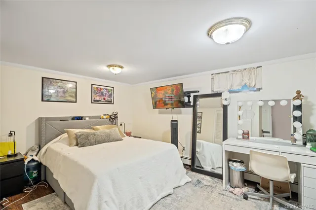 a bedroom with a bed and a table