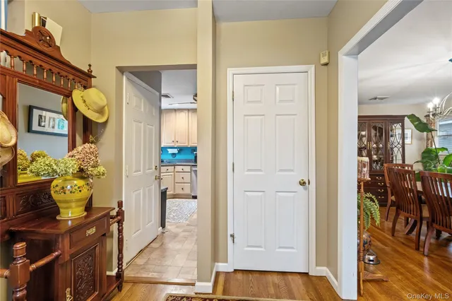 a view of an entryway and livingroom