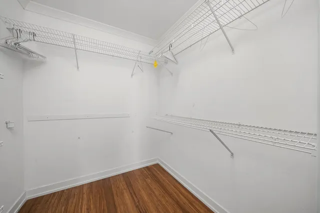 a view of a room with racks on the wall