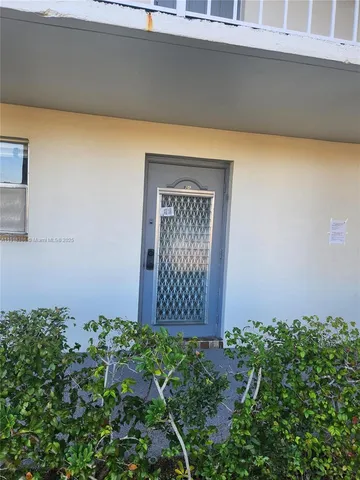a workspace with furniture and window