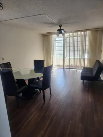 a kitchen with appliances and cabinets
