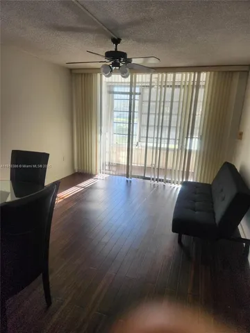 a bathroom with a toilet a sink and a shower