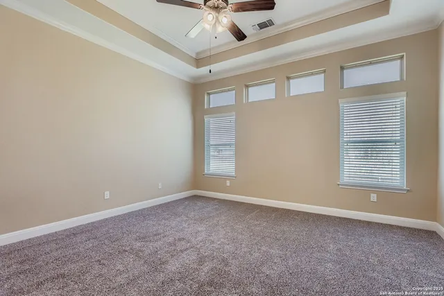 a bathroom with a bathtub a sink a vanity and a shower