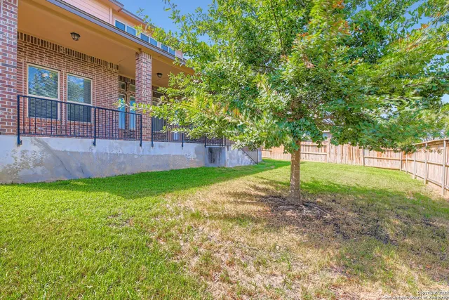 a view of a backyard with a garden