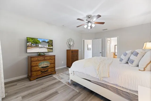 a bathroom with a shower and a sink