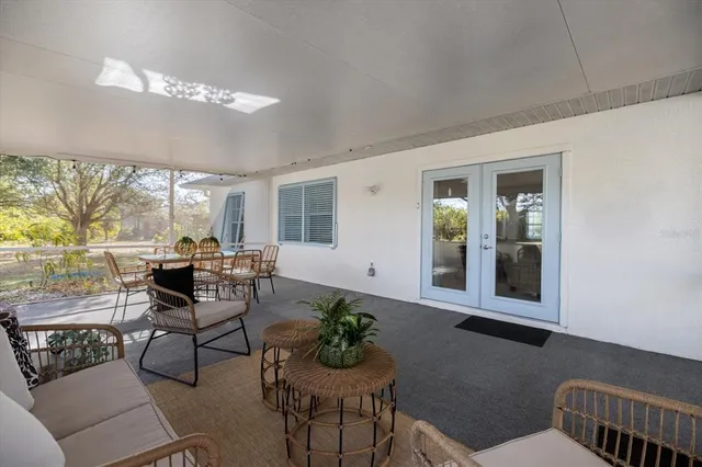 a view of a park with large trees