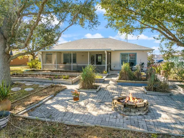 an aerial view of residential building and lake