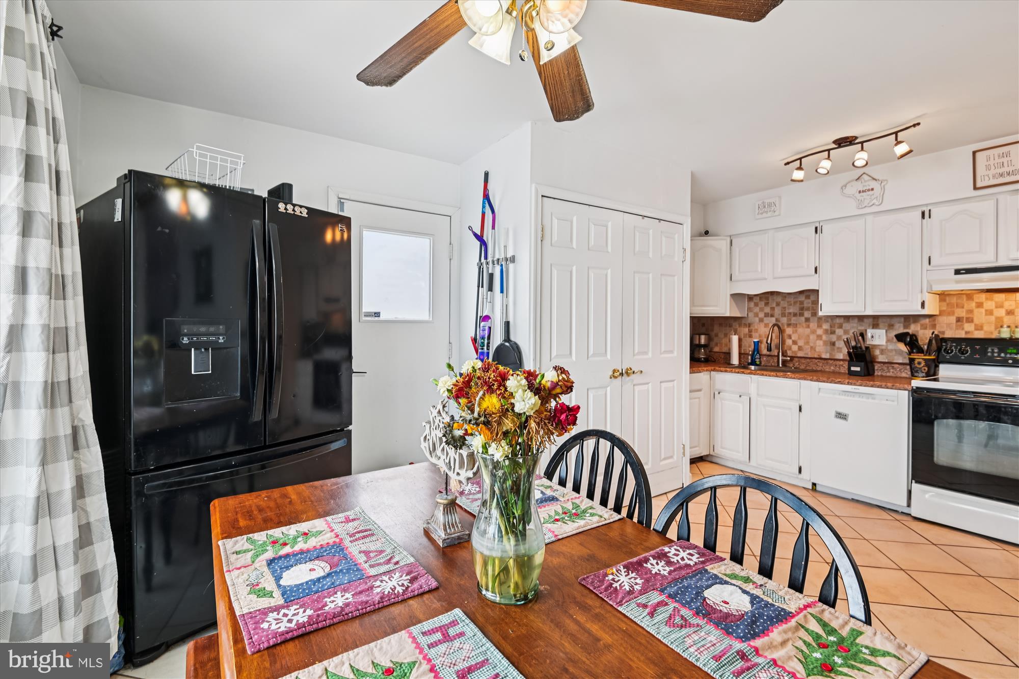 1091 Notley Court Pasadena, MD 21122 - Photo 11 of 36 a kitchen with stainless steel appliances granite countertop a refrigerator and microwave
