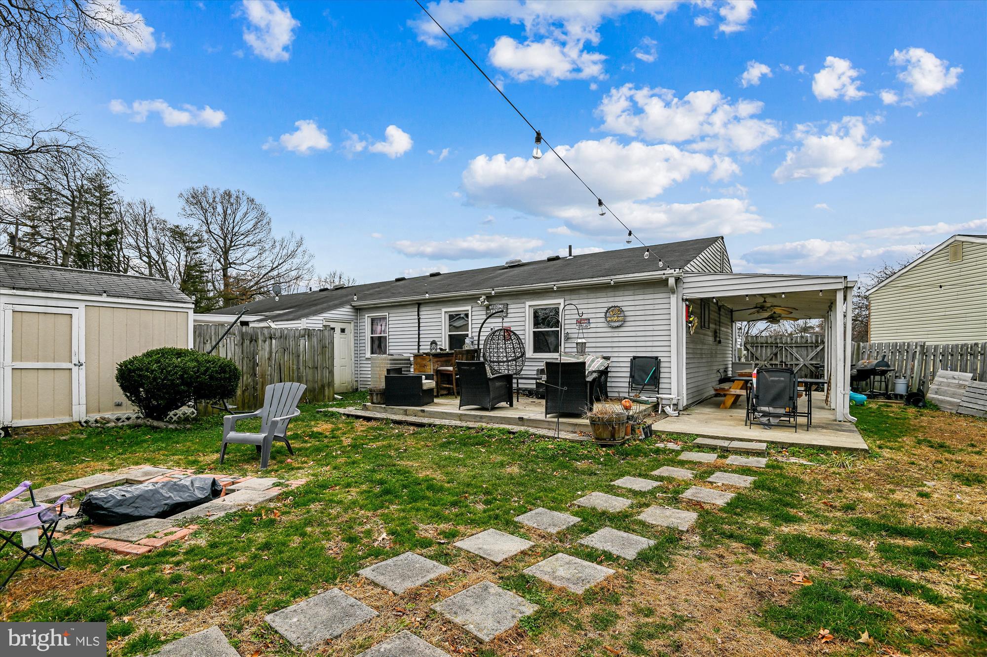 1091 Notley Court Pasadena, MD 21122 - Photo 28 of 36 a view of a house with backyard porch and sitting area