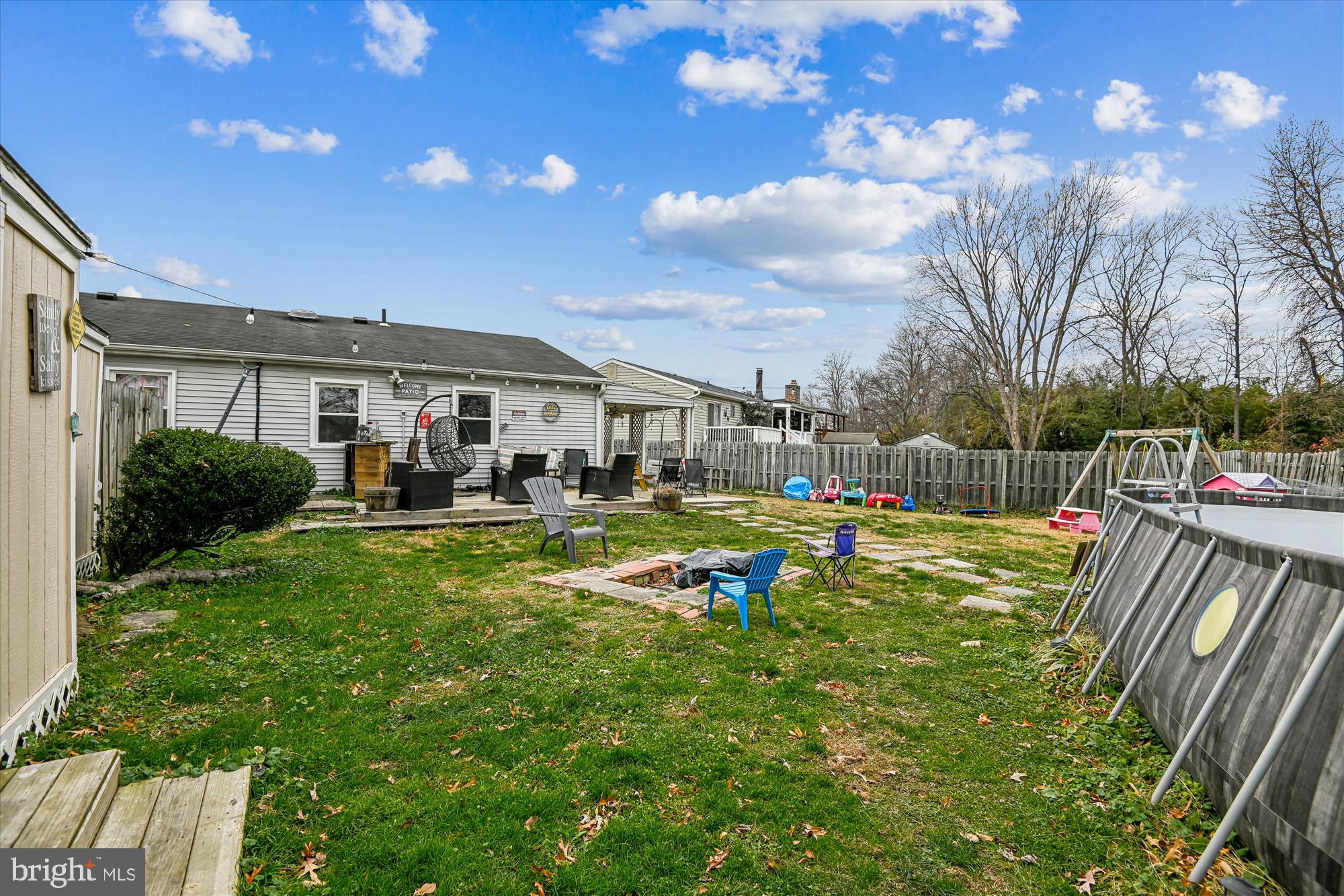 1091 Notley Court Pasadena, MD 21122 - Photo 29 of 36 a view of a house with swimming pool and sitting area