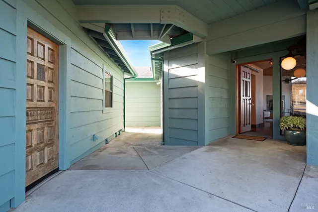 a view of the house with a yard