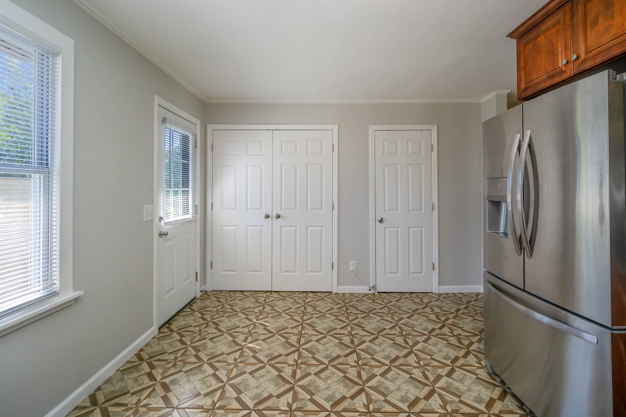 106 Jordan Avenue Mount Pleasant, TN 38474 - Photo 13 of 30 a view of a closet area with wooden floor and a window