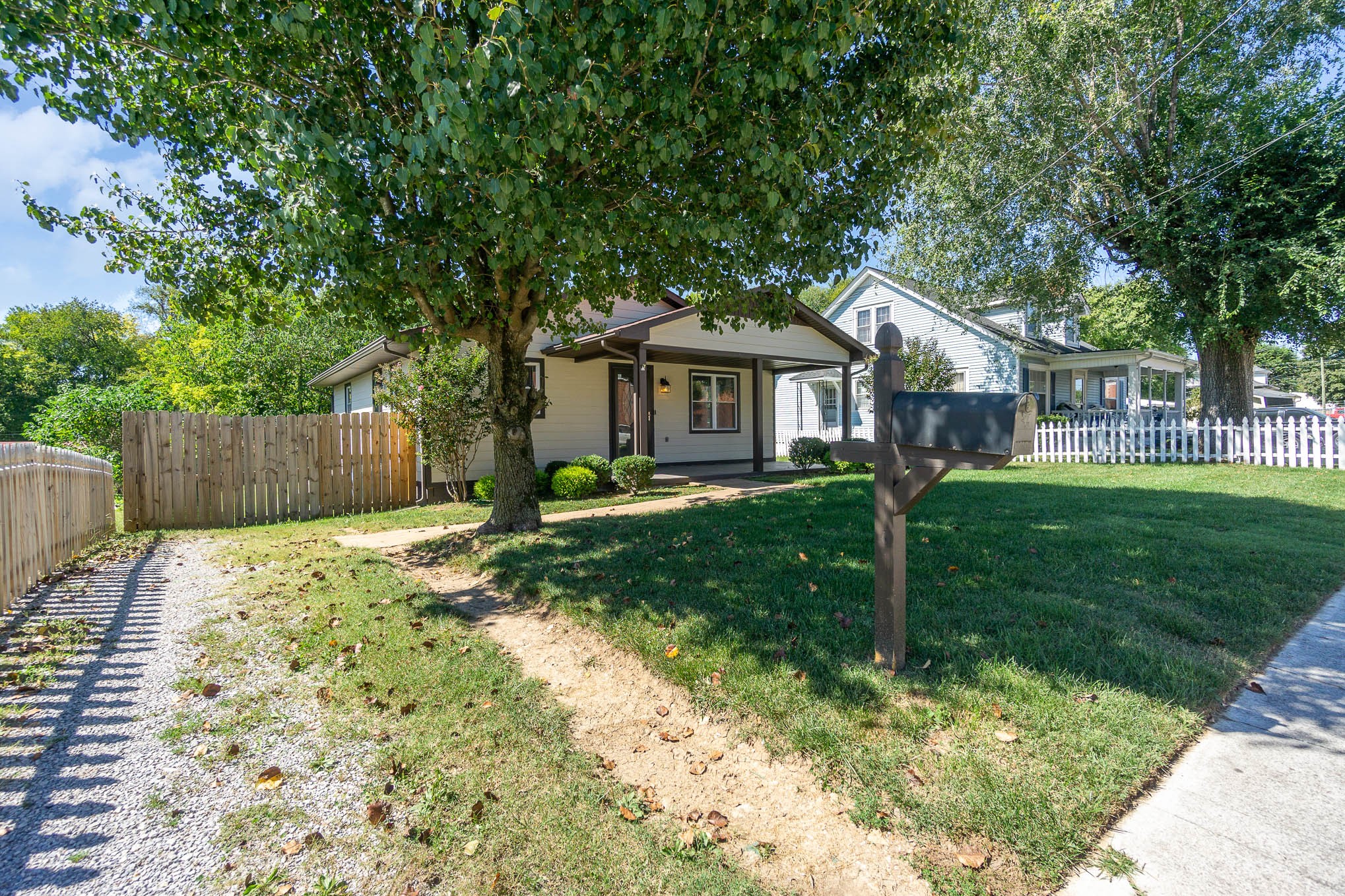 106 Jordan Avenue Mount Pleasant, TN 38474 - Photo 2 of 30 a front view of a house with a yard