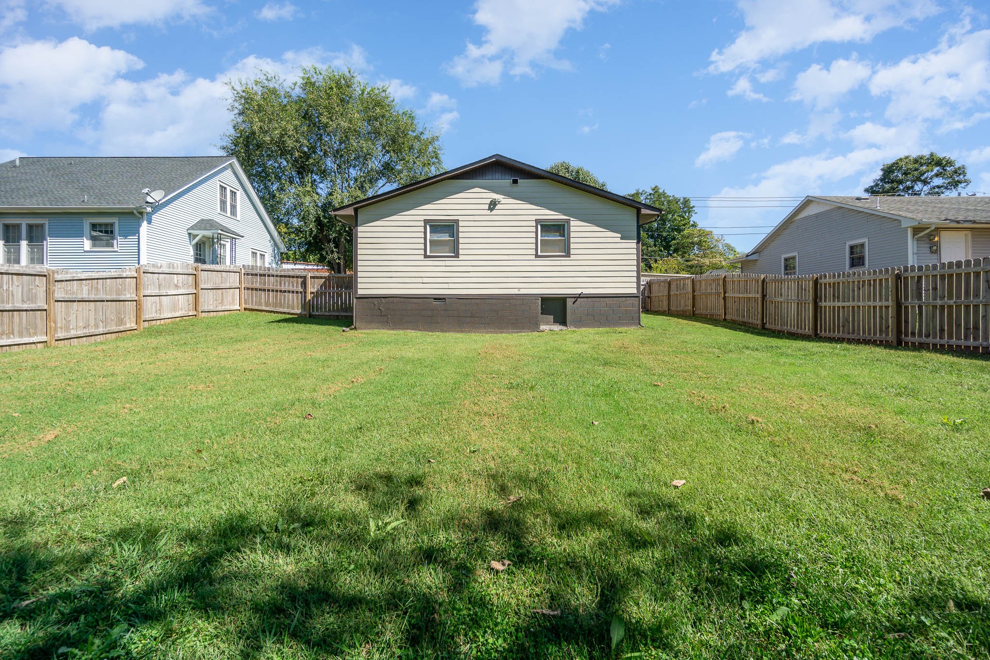 106 Jordan Avenue Mount Pleasant, TN 38474 - Photo 27 of 30 a view of a backyard of the house