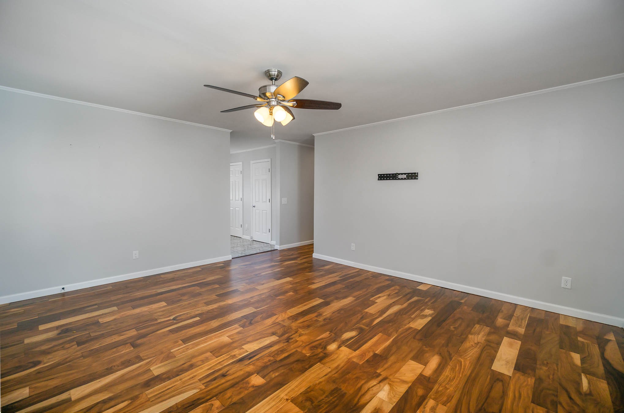 106 Jordan Avenue Mount Pleasant, TN 38474 - Photo 9 of 30 wooden floor in an empty room