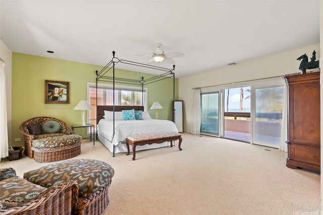 a bedroom with furniture and a window