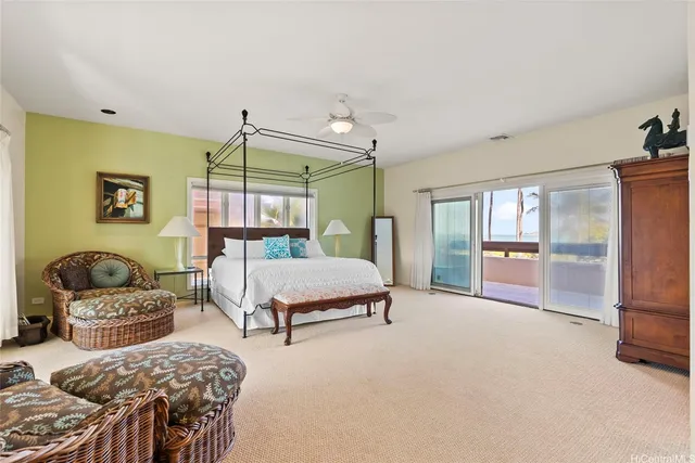 a bedroom with furniture and a window