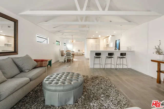 a living room with furniture and a view of living room