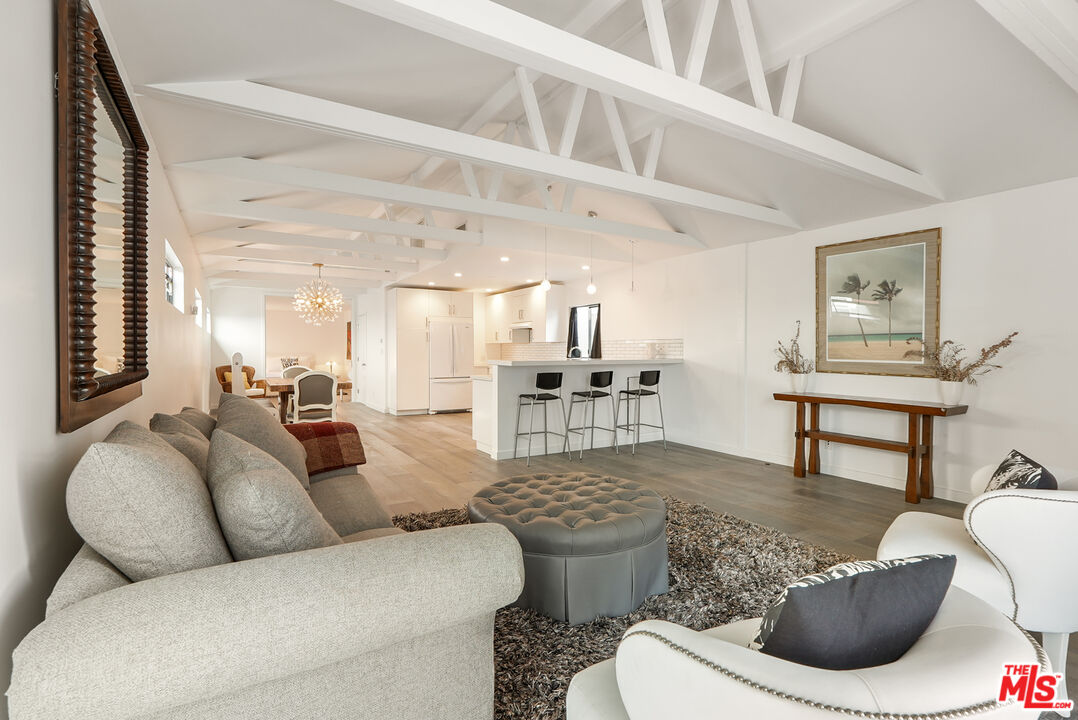 754 Washington Boulevard Marina del Rey, CA 90292 - Photo 4 of 16 a living room with furniture and a view of bathroom