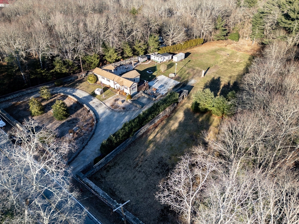 25 Mendall Road Acushnet, MA 02743 - Photo 1 of 23 a view of a yard with an outdoor seating
