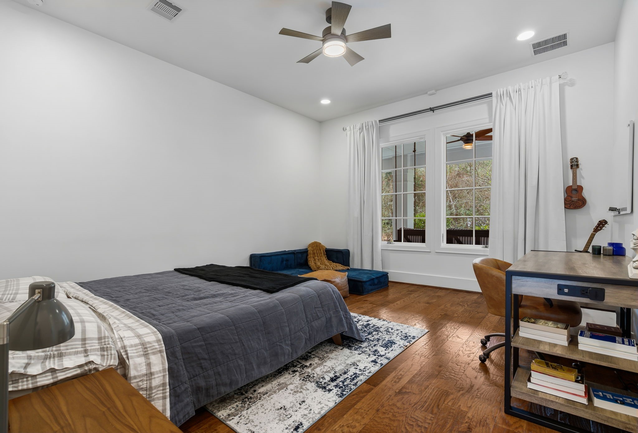10 Riata Drive Magnolia, TX 77354 - Photo 27 of 48 The downstairs primary bedroom with en-suite bathroom and large closet is perfect for multi-generational living.