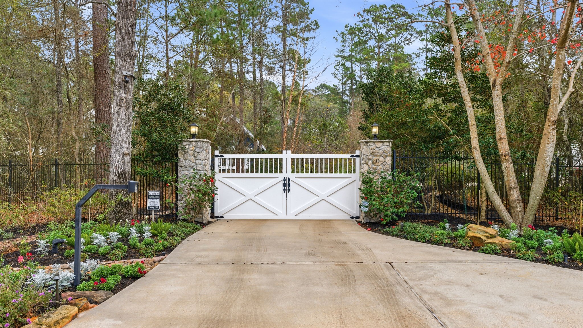 10 Riata Drive Magnolia, TX 77354 - Photo 41 of 48 For the security conscious and those wanting peace of mind, the neighborhood is gated and the home has a custom mechanical security gate and a Ring security camera.