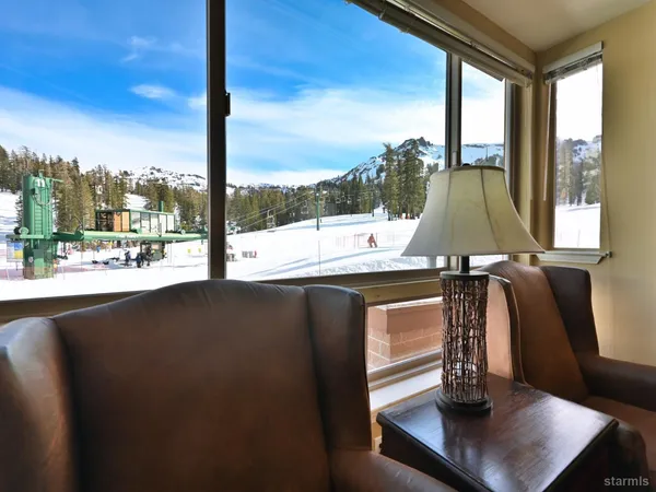 a view of a balcony with city view