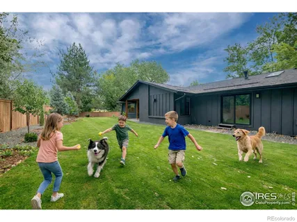 a childrens park with lots of swings and slides