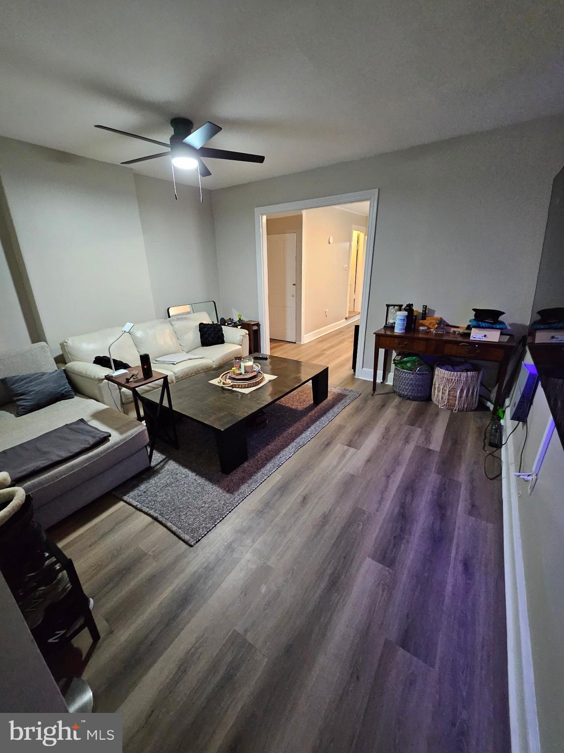 209 Mill Street Mount Holly, NJ 08060 - Photo 4 of 13 a living room with furniture and a wooden floor