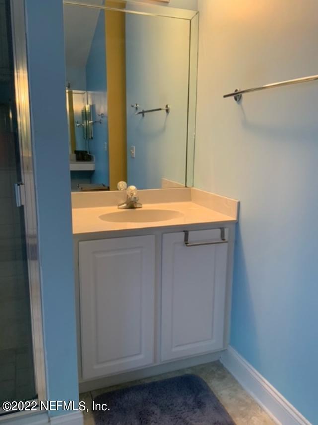 55244 Yellow Jacket Drive Callahan, FL 32011 - Photo 13 of 22 a room with a sink and a mirror