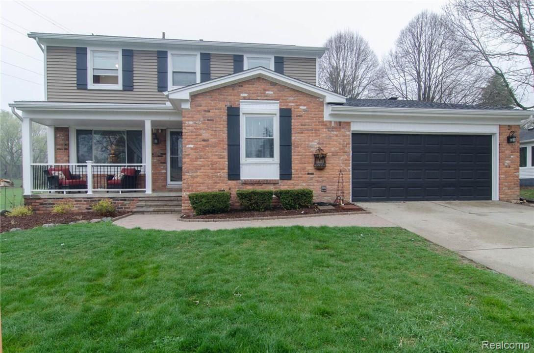 Amazing curb appeal on this 4 Bed/2.5 Bath Beauty!!  New roof, siding, porch and more!