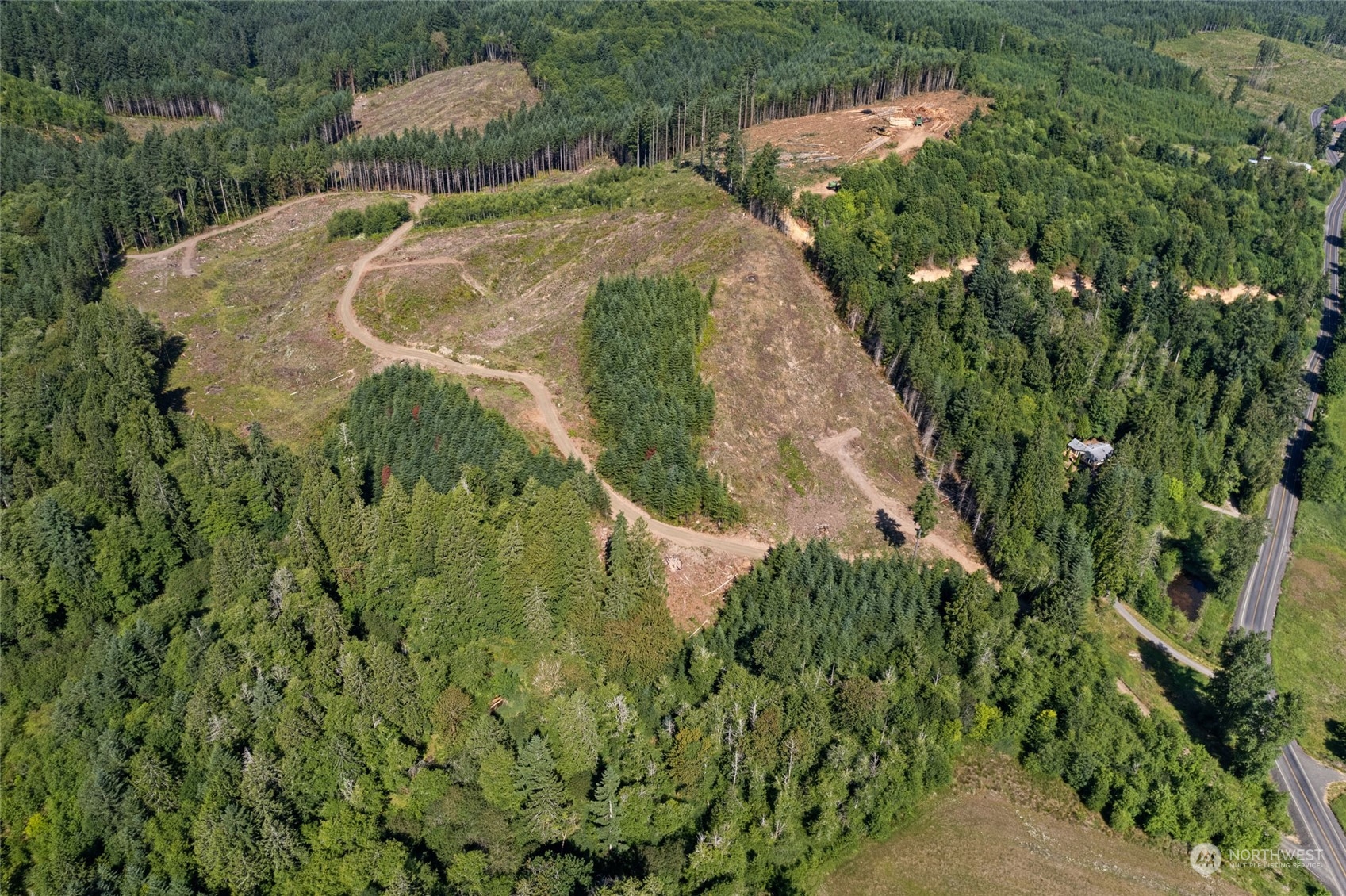 4 Bunker Creek Road Chehalis, WA 98532 - Photo 8 of 15 an aerial view of a house with a yard and trees